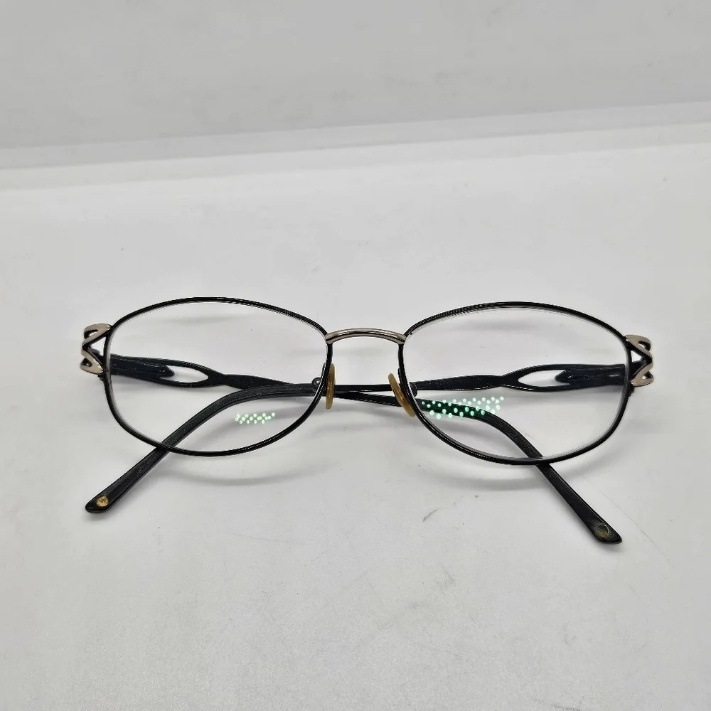 wire frame glasses signed VP FOR FRAMES ONLY